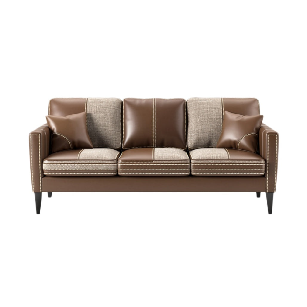 Elegante leren bank met kussen en stiksels